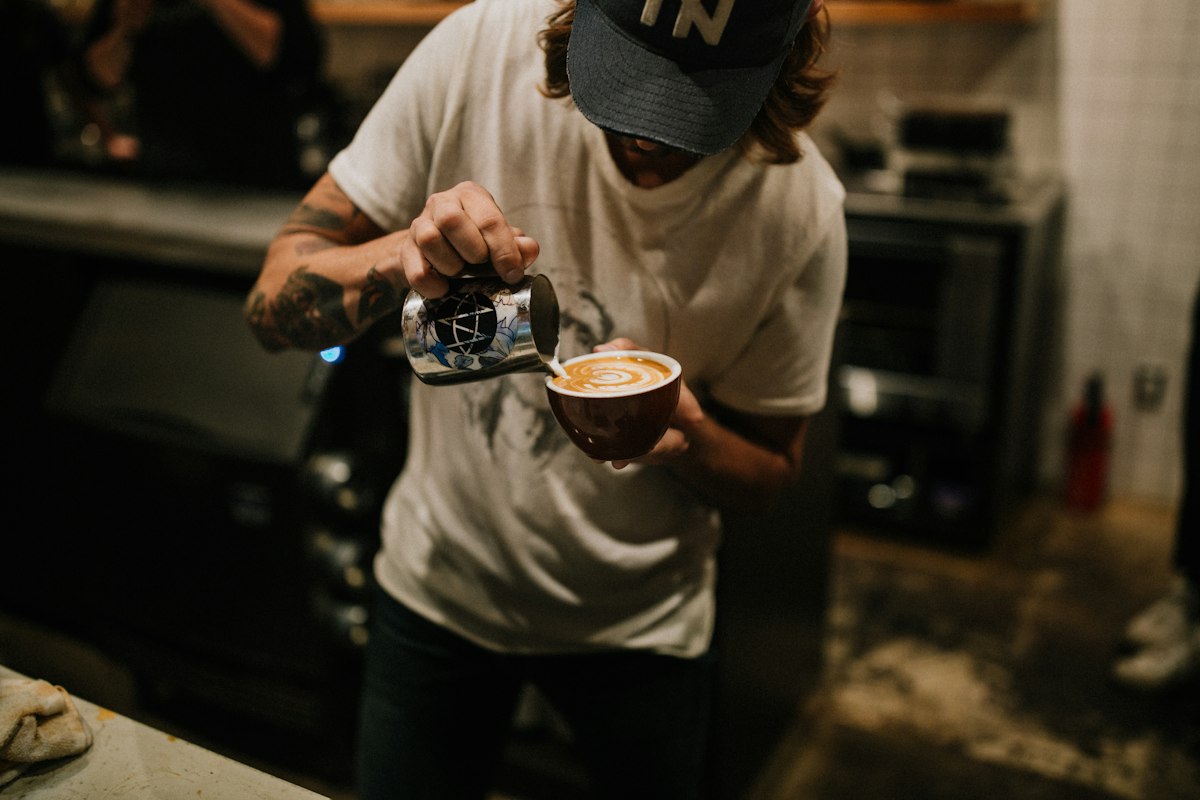 Barista preparing a coffee drink, illustrative photograph