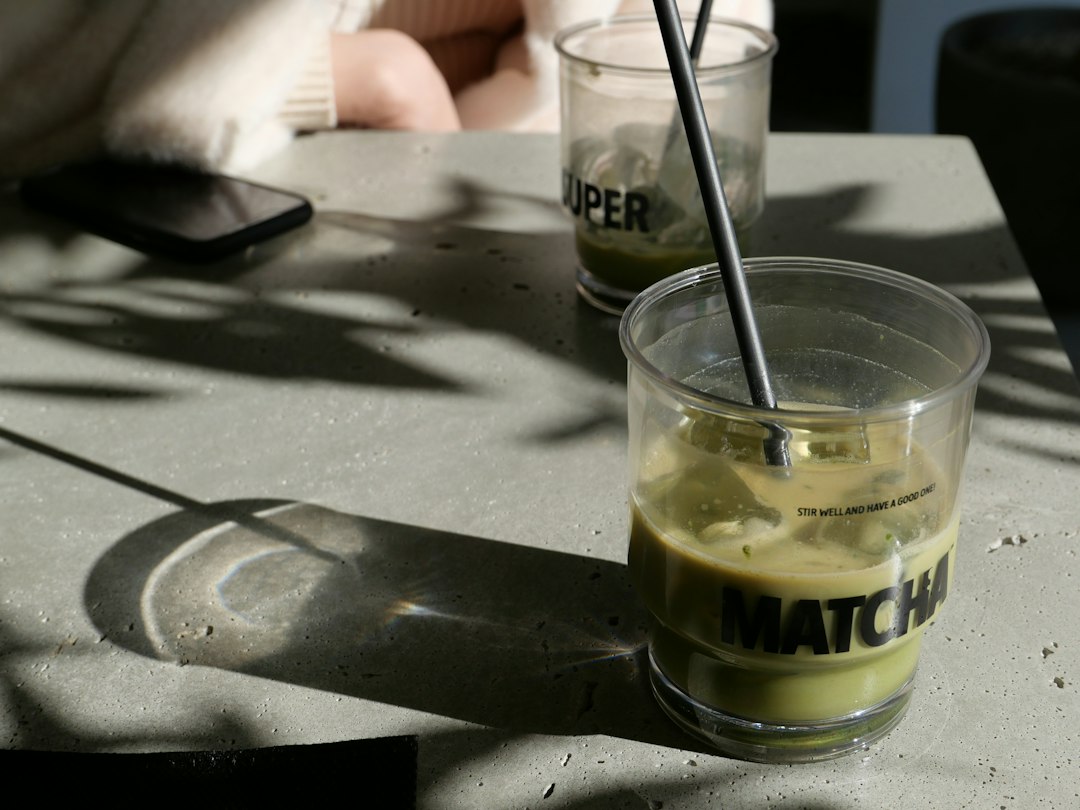 Cold tea drink with straw
