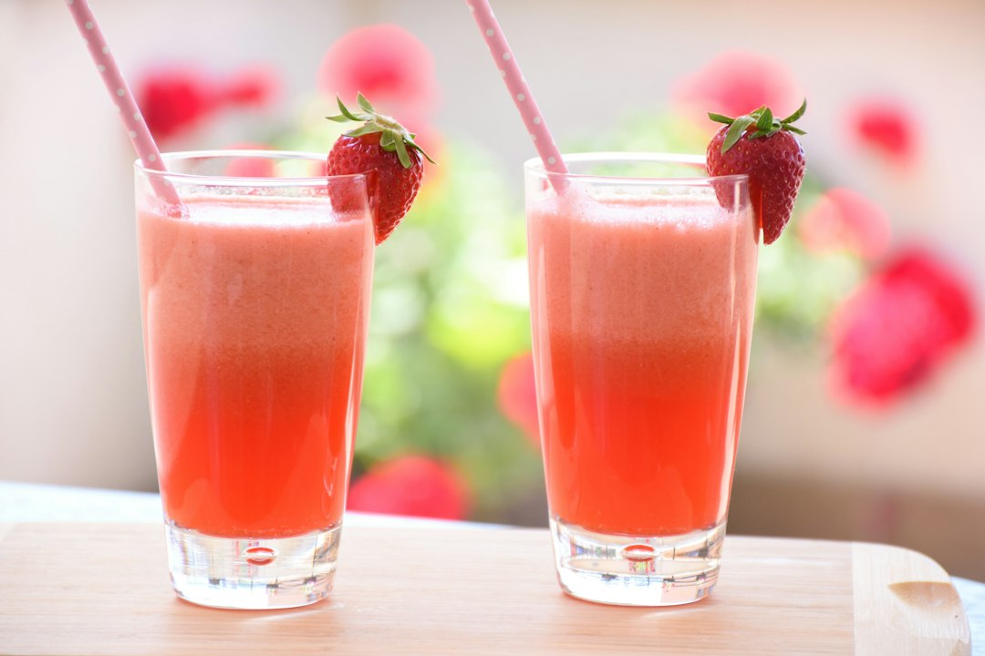 Two strawberry lemonade drinks